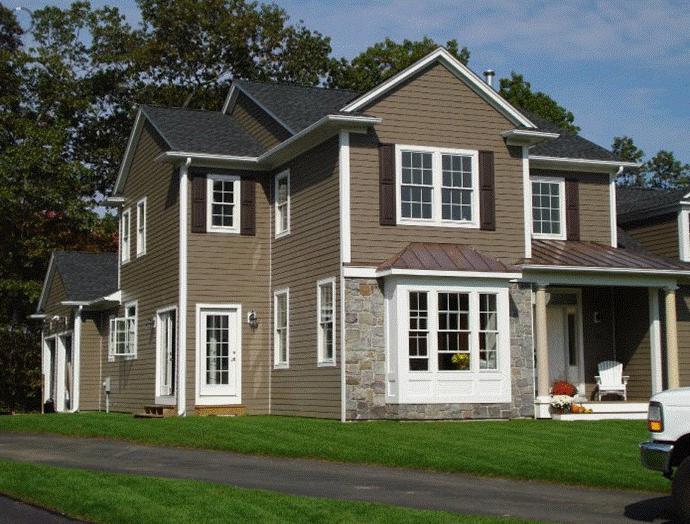 comment recouvrir une maison en bois avec un parement