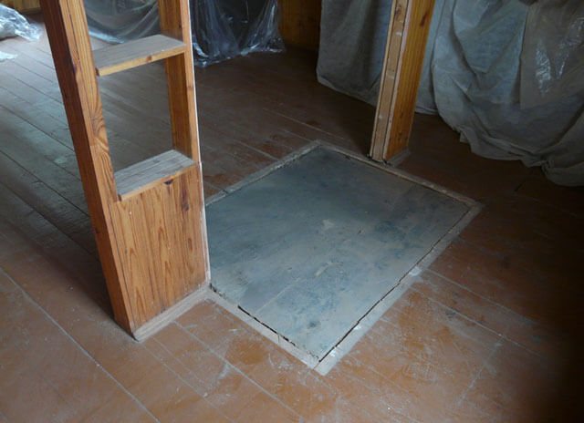 comment installer un poêle en fer dans une maison en bois