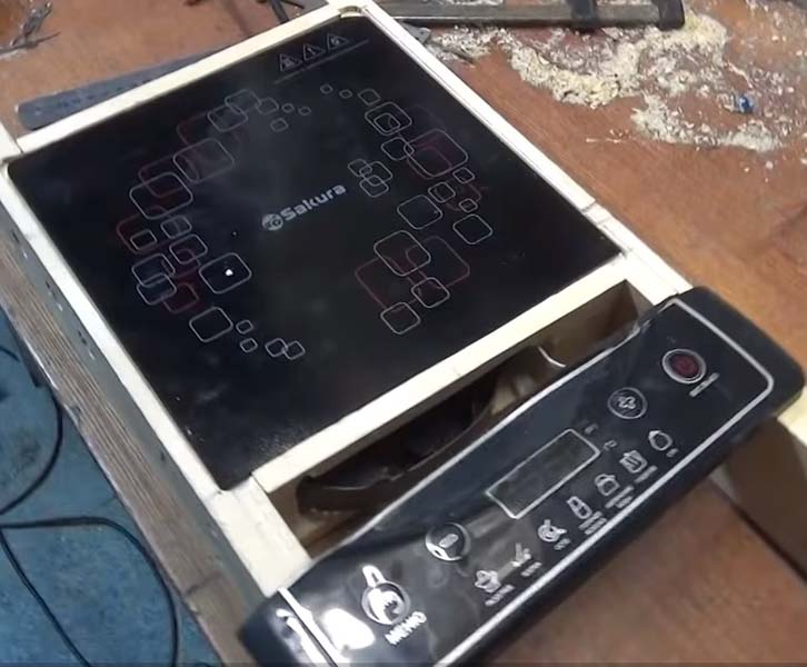 Table de cuisson à induction Picture dans un coffret en bois