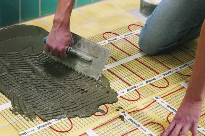 Installation de chauffage par le sol électrique