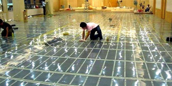 Installation de films IR sous les carreaux