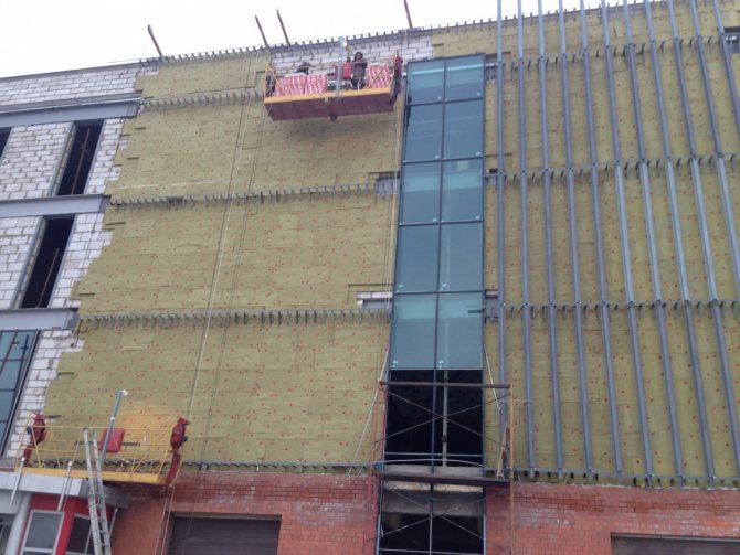 installation d'un système de fixation de façade interfloor