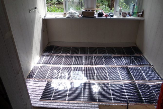 Installation de chauffage au sol sur le balcon