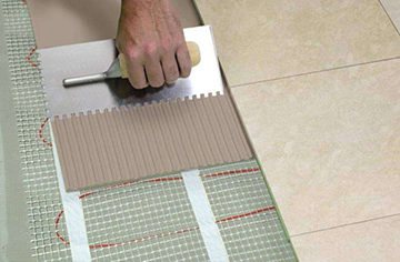 organisation du plancher chauffant dans la salle de bain