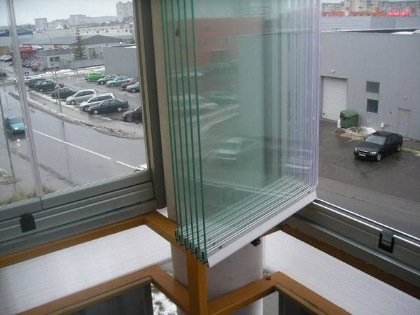 Vitrage panoramique d'un balcon: types et caractéristiques de la technologie