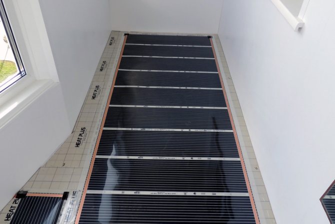 Installation d'un plancher chauffant à l'eau sur le balcon