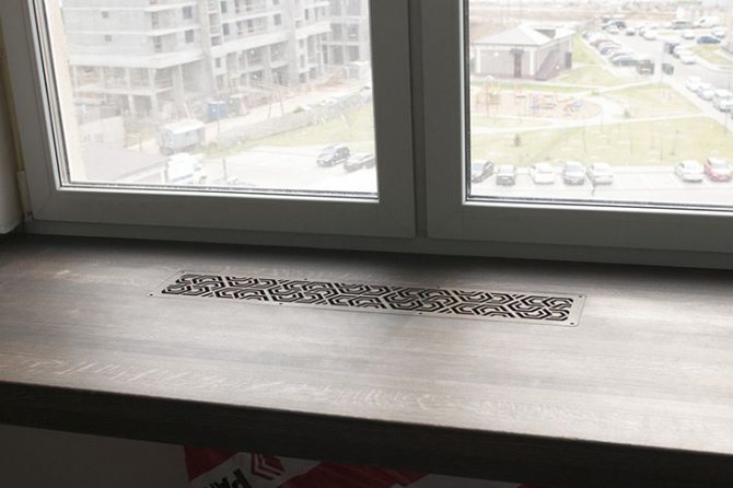Grille de ventilation en bois